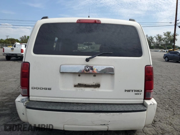 2010 Dodge Nitro SXT z VIN 1D4PT5GK8AW100343, wystawiony jako Copart lot #74628804 z przebiegiem 156 612 mil mil oraz Szkoda całkowita • Salvage title. Historia ofert i sprzedaży dostępna na DreamBid. Obrazek 6.