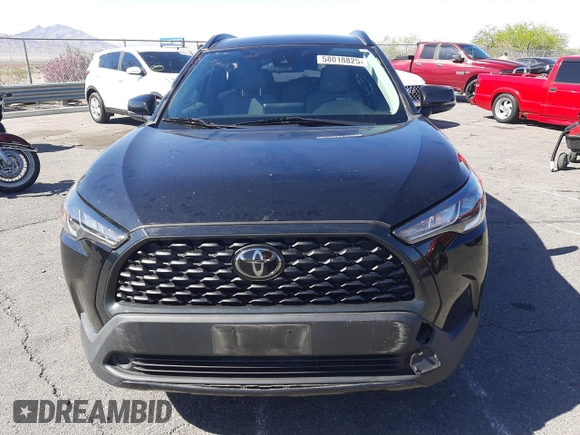 2022 Toyota Corolla Cross LE with VIN 7MUCAABG1NV033299, listed as a Copart auction lot 58018825 with 28,138 mi miles and Salvage title. Bid and sale history available at DreamBid. Image 5.
