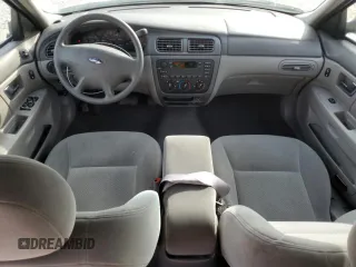 2003 Ford Taurus LX Standard z VIN 1FAFP52U93A159333, wystawiony jako Copart lot #78080944 z przebiegiem 54 652 mil mil oraz Szkoda całkowita • Salvage title. Historia ofert i sprzedaży dostępna na DreamBid. Obrazek 8.