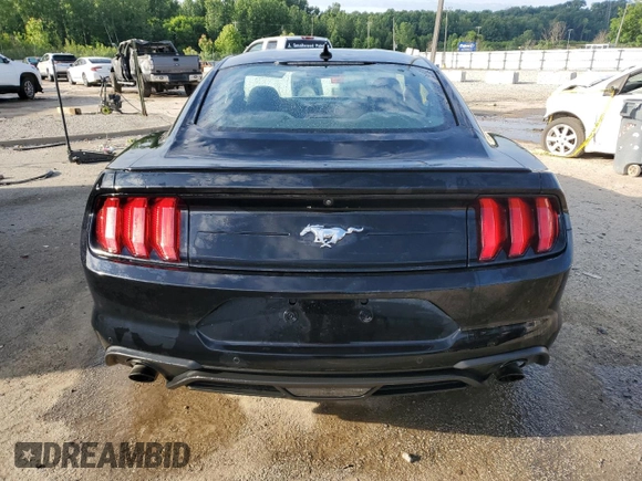 2021 Ford Mustang EcoBoost with VIN 1FA6P8THXM5112258, listed as a Copart auction lot 57501095 with 83,309 mi miles and Salvage title. Bid and sale history available at DreamBid. Image 6.
