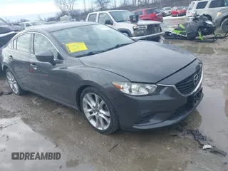 2017 Mazda Mazda6 Touring with VIN JM1GL1V5XH1135153, listed as a IAAI auction lot 41666876 with 71,674 mi miles. Bid and sale history available at carsss.com. Image 1.