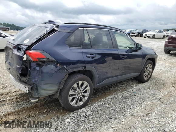 2022 Toyota RAV4 XLE Premium with VIN JTMC1RFV7ND087414, listed as a Copart auction lot 60844905 with 90,232 mi miles and Salvage title. Bid and sale history available at DreamBid. Image 3.