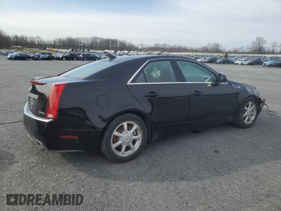 2009 Cadillac CTS AWD with VIN 1G6DS57V890167054, listed as a Copart auction lot 51632805 with 114,968 mi miles and Salvage Title. Bid and sale history available at DreamBid. Image 3.