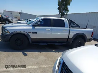 2016 Ram 1500 Rebel z VIN 1C6RR7YT5GS251994, wystawiony jako IAAI lot #42139378 z przebiegiem 102 736 mil mil oraz . Historia ofert i sprzedaży dostępna na DreamBid. Obrazek 14.
