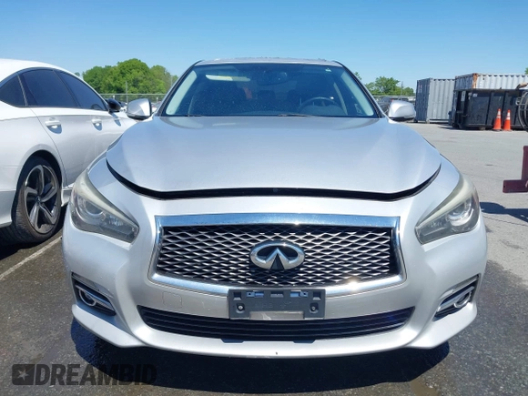 2017 Infiniti Q50 Premium z VIN JN1EV7AP3HM734389, wystawiony jako IAAI lot #42037510 z przebiegiem 125 130 mil mil oraz . Historia ofert i sprzedaży dostępna na DreamBid. Obrazek 12.