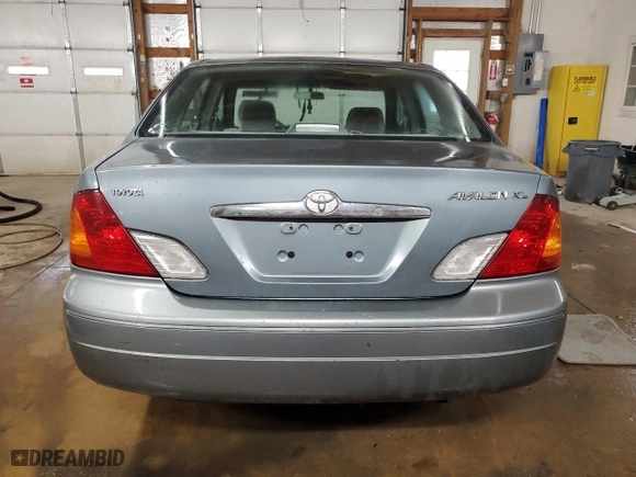 2000 Toyota Avalon XL with VIN 4T1BF28B9YU052848, listed as a Copart auction lot 82342444 with NaN miles and Salvage Title. Bid and sale history available at carsss.com. Image 6.