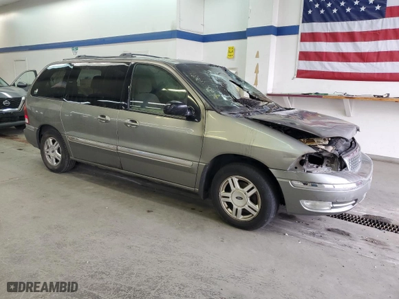 2003 Ford Windstar Wagon SE with VIN 2FMZA52403BB67426, listed as a Copart auction lot 77018904 with 0 mi miles and Salvage Title. Bid and sale history available at carsss.com. Image 4.