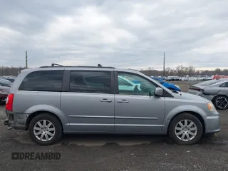 2014 Chrysler Town & Country Touring with VIN 2C4RC1BG1ER343069, listed as a IAAI auction lot 41683253 with 137,978 mi miles and . Bid and sale history available at DreamBid. Image 13.