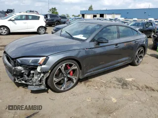 2019 Audi RS 5 Sportback z VIN WUABWCF50KA907035, wystawiony jako Copart lot #65824283 z przebiegiem 32 063 mil mil oraz . Historia ofert i sprzedaży dostępna na DreamBid. Obrazek 1.