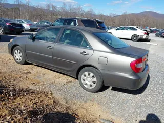 2004 Toyota Camry LE with VIN 4T1BE32K54U904138, listed as a IAAI auction lot 41792208 with 217,829 mi miles and . Bid and sale history available at carsss.com. Image 3.