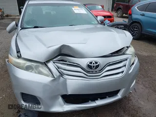 2011 Toyota Camry LE z VIN 4T1BF3EK6BU671814, wystawiony jako IAAI lot #42367753 z przebiegiem 182 728 mil mil oraz . Historia ofert i sprzedaży dostępna na DreamBid. Obrazek 6.
