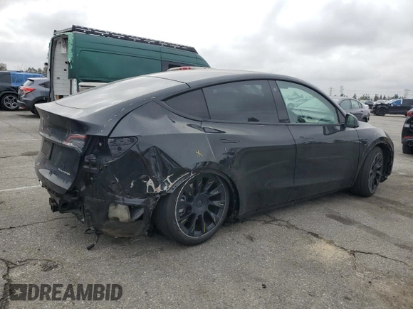 2021 Tesla Model Y Long Range z VIN 5YJYGAEE5MF143672, wystawiony jako Copart lot #55962875 z przebiegiem 74 644 mil mil oraz Szkoda całkowita • Salvage title. Historia ofert i sprzedaży dostępna na DreamBid. Obrazek 3.