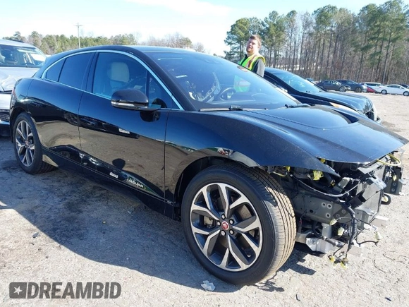 2020 Jaguar I-Pace SE with VIN SADHC2S12L1F87240, listed as a IAAI auction lot 41489254 with 58,359 mi miles and . Bid and sale history available at DreamBid. Image 1.