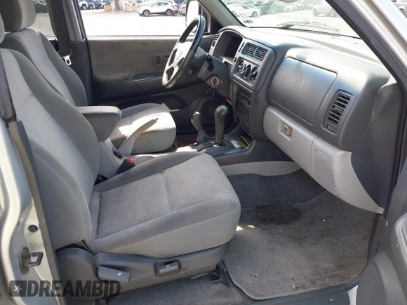 2003 Mitsubishi Montero XLS z VIN JA4MT31R03J023679, wystawiony jako IAAI lot #41872682 z przebiegiem 148 365 mil mil oraz . Historia ofert i sprzedaży dostępna na DreamBid. Obrazek 5.