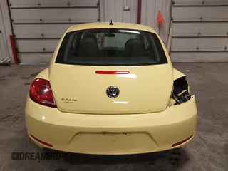 2015 Volkswagen Beetle Classic z VIN 3VWF17AT0FM611710, wystawiony jako IAAI lot #42209254 z przebiegiem 87 583 mil mil oraz . Historia ofert i sprzedaży dostępna na DreamBid. Obrazek 17.
