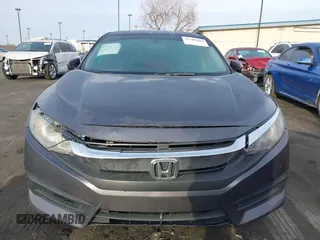 2017 Honda Civic Sedan LX with VIN 19XFC2F59HE204377, listed as a IAAI auction lot 41706604 with 160,114 mi miles. Bid and sale history available at carsss.com. Image 13.