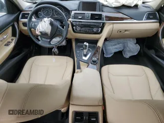 2017 BMW 3 Series 320i xDrive with VIN WBA8E5G5XHNU22436, listed as a Copart auction lot 52702805 with 74,008 mi miles and Salvage title. Bid and sale history available at DreamBid. Image 8.