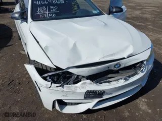 2019 BMW M4 with VIN WBS4Y9C5XKAG67446, listed as a IAAI auction lot 41669865 with 103,230 mi miles. Bid and sale history available at carsss.com. Image 6.