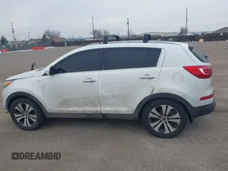 2013 Kia Sportage EX with VIN KNDPCCA24D7531349, listed as a IAAI auction lot 41601181 with 97,004 mi miles and . Bid and sale history available at DreamBid. Image 14.