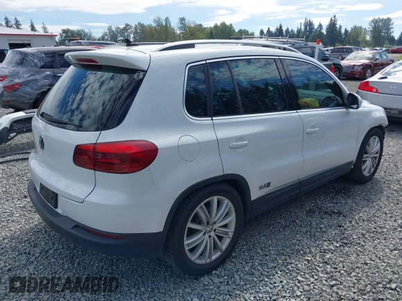 2016 Volkswagen Tiguan S with VIN WVGBV7AXXGW580052, listed as a IAAI auction lot 41444015 with 102,165 mi miles and . Bid and sale history available at DreamBid. Image 4.