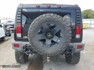 2006 Hummer H2 with VIN 5GRGN23U26H100264, listed as a Copart auction lot 58083494 with 169,104 mi miles and Salvage Title. Bid and sale history available at carsss.com. Image 6.