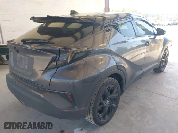 2021 Toyota C-HR LE with VIN JTNKHMBX5M1129253, listed as a IAAI auction lot 42169707 with 54,312 mi miles and . Bid and sale history available at DreamBid. Image 4.