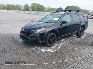 2022 Subaru Outback Wilderness with VIN 4S4BTGUD5N3112137, listed as a IAAI auction lot 41903526 with 77,502 mi miles and . Bid and sale history available at DreamBid. Image 2.