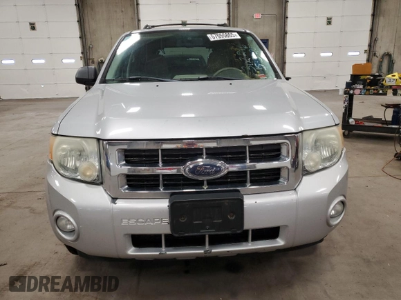 2008 Ford Escape XLT с VIN 1FMCU93128KD51496, выставлен на аукционе Copart как лот 57055865 с пробегом 204 224 миль миль и Списание • Salvage title. История ставок и продаж доступна на DreamBid. Изображение 5.