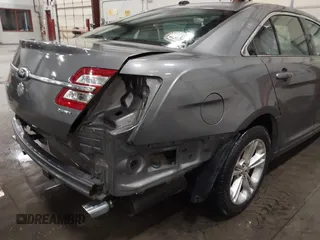 2013 Ford Taurus SEL with VIN 1FAHP2E86DG177504, listed as a IAAI auction lot 42071852 with 130,547 mi miles and . Bid and sale history available at carsss.com. Image 14.