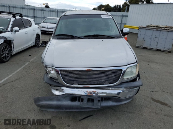 2002 Ford F-150 XLT with VIN 1FTRW07602KE38959, listed as a Copart auction lot 50547095 with 160,908 mi miles and Salvage Title. Bid and sale history available at carsss.com. Image 5.