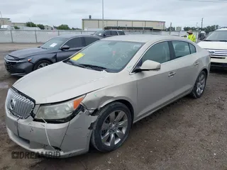 2011 Buick LaCrosse CXS with VIN 1G4GE5ED4BF301990, listed as a IAAI auction lot 41987714 with 144,554 mi miles and . Bid and sale history available at DreamBid. Image 17.