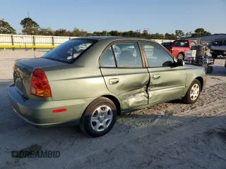 2005 Hyundai Accent GLS with VIN KMHCG45C35U595666, listed as a Copart auction lot 88294365 with 70,497 mi miles and Salvage Title. Bid and sale history available at carsss.com. Image 3.