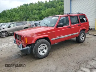 2001 Jeep Cherokee Sport with VIN 1J4FT48S41L570480, listed as a Copart auction lot 56123925 with 216,338 mi miles and Salvage title. Bid and sale history available at DreamBid. Image 1.