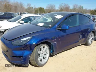 2023 Tesla Model Y Long Range with VIN 7SAYGDEE6PF847890, listed as a IAAI auction lot 41635687 with 32,846 mi miles and . Bid and sale history available at DreamBid. Image 18.