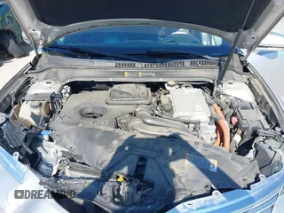 2014 Lincoln MKZ Hybrid with VIN 3LN6L2LU5ER822663, listed as a IAAI auction lot 42656735 with 122,025 mi miles and . Bid and sale history available at DreamBid. Image 10.
