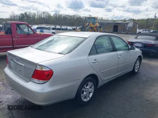 2005 Toyota Camry LE with VIN 4T1BF30K35U608097, listed as a IAAI auction lot 41908838 with 75,601 mi miles and . Bid and sale history available at DreamBid. Image 4.