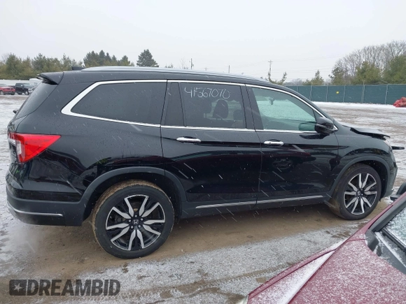 2021 Honda Pilot Touring 8-Passenger z VIN 5FNYF6H94MB091384, wystawiony jako IAAI lot #41567070 z przebiegiem 78 330 mil mil oraz . Historia ofert i sprzedaży dostępna na DreamBid. Obrazek 13.