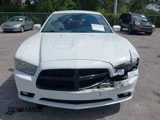 2014 Dodge Charger SXT z VIN 2C3CDXJG8EH339862, wystawiony jako IAAI lot #42373763 z przebiegiem 171 009 mil mil oraz . Historia ofert i sprzedaży dostępna na DreamBid. Obrazek 12.