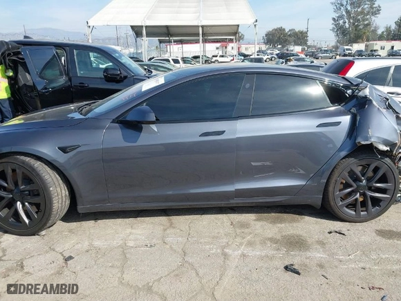 2021 Tesla Model S Plaid with VIN 5YJSA1E66MF452244, listed as a IAAI auction lot 41603437 with 39,290 mi miles. Bid and sale history available at carsss.com. Image 14.