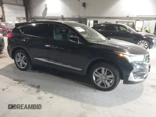 2021 Acura RDX w/Advance Package with VIN 5J8TC2H7XML030078, listed as a IAAI auction lot 41320663 with 74,478 mi miles. Bid and sale history available at carsss.com. Image 1.