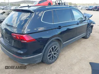 2021 Volkswagen Tiguan SE with VIN 3VV3B7AX3MM157702, listed as a IAAI auction lot 41888479 with 51,807 mi miles and . Bid and sale history available at DreamBid. Image 4.