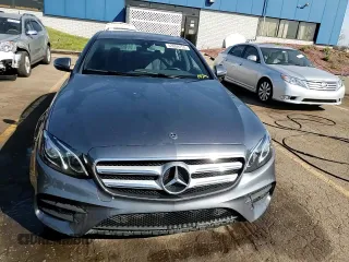 2018 Mercedes-Benz E 300 z VIN WDDZF4KB8JA313472, wystawiony jako Copart lot #53959155 z przebiegiem Nie podano mil oraz Czysty tytuł • Clean title. Historia ofert i sprzedaży dostępna na DreamBid. Obrazek 13.