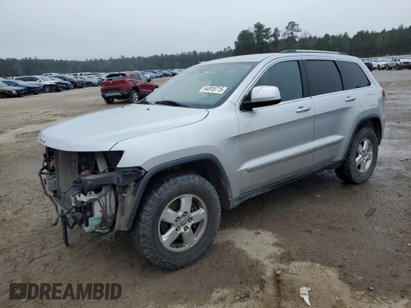 2012 Jeep Grand Cherokee Laredo with VIN 1C4RJFAG2CC294202, listed as a Copart auction lot 44918715 with 104,605 mi miles and Salvage Title. Bid and sale history available at carsss.com. Image 1.