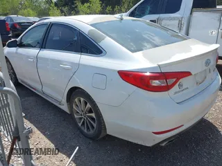 2015 Hyundai Sonata 2.4L Sport with VIN 5NPE34AF5FH094086, listed as a IAAI auction lot 42041499 with 228,527 mi miles. Bid and sale history available at carsss.com. Image 3.