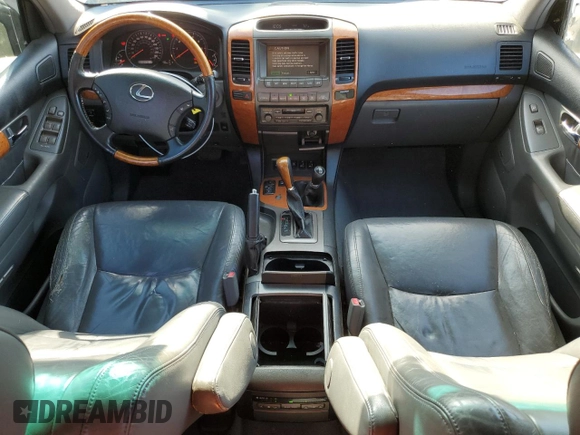 2005 Lexus GX 470 with VIN JTJBT20X650068722, listed as a Copart auction lot 62931984 with 247,819 mi miles and Salvage Title. Bid and sale history available at carsss.com. Image 8.