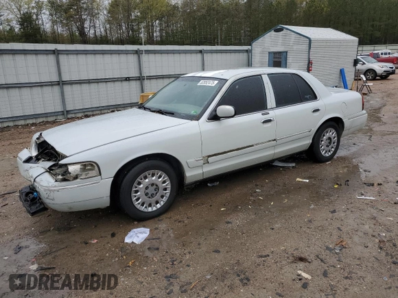 2003 Mercury Grand Marquis GS Convenience z VIN 2MEFM74W53X702387, wystawiony jako Copart lot #52852475 z przebiegiem 246 543 mil mil oraz Szkoda całkowita • Salvage title. Historia ofert i sprzedaży dostępna na DreamBid. Obrazek 1.