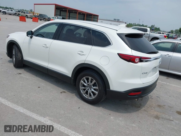 2019 Mazda CX-9 Touring with VIN JM3TCACY1K0334804, listed as a IAAI auction lot 42411662 with 49,447 mi miles and . Bid and sale history available at DreamBid. Image 3.