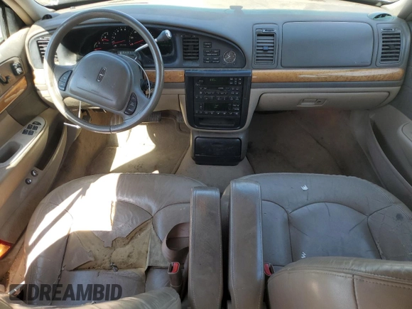 2001 Lincoln Continental z VIN 1LNHM97V31Y673523, wystawiony jako Copart lot #52451385 z przebiegiem 133 879 mil mil oraz Szkoda całkowita • Salvage title. Historia ofert i sprzedaży dostępna na DreamBid. Obrazek 8.