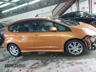2009 Honda Fit Sport with VIN JHMGE88469S069328, listed as a IAAI auction lot 41464558 with 219,541 mi miles. Bid and sale history available at carsss.com. Image 13.