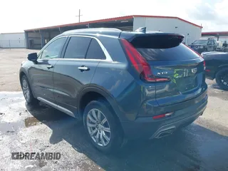 2021 Cadillac XT4 FWD Premium Luxury with VIN 1GYFZCR42MF007617, listed as a IAAI auction lot 42437974 with 126,071 mi miles and . Bid and sale history available at DreamBid. Image 3.